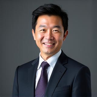 Professional headshot of the executive coach, Itou Taro.