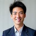 Professional headshot of Sato Kenji.